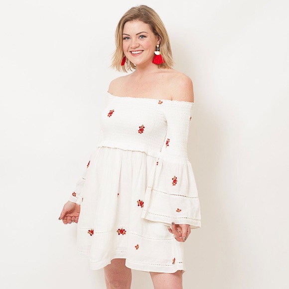 white off the shoulder dress with red flowers